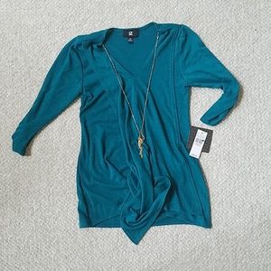 turquoise blue dress shirt with necklace